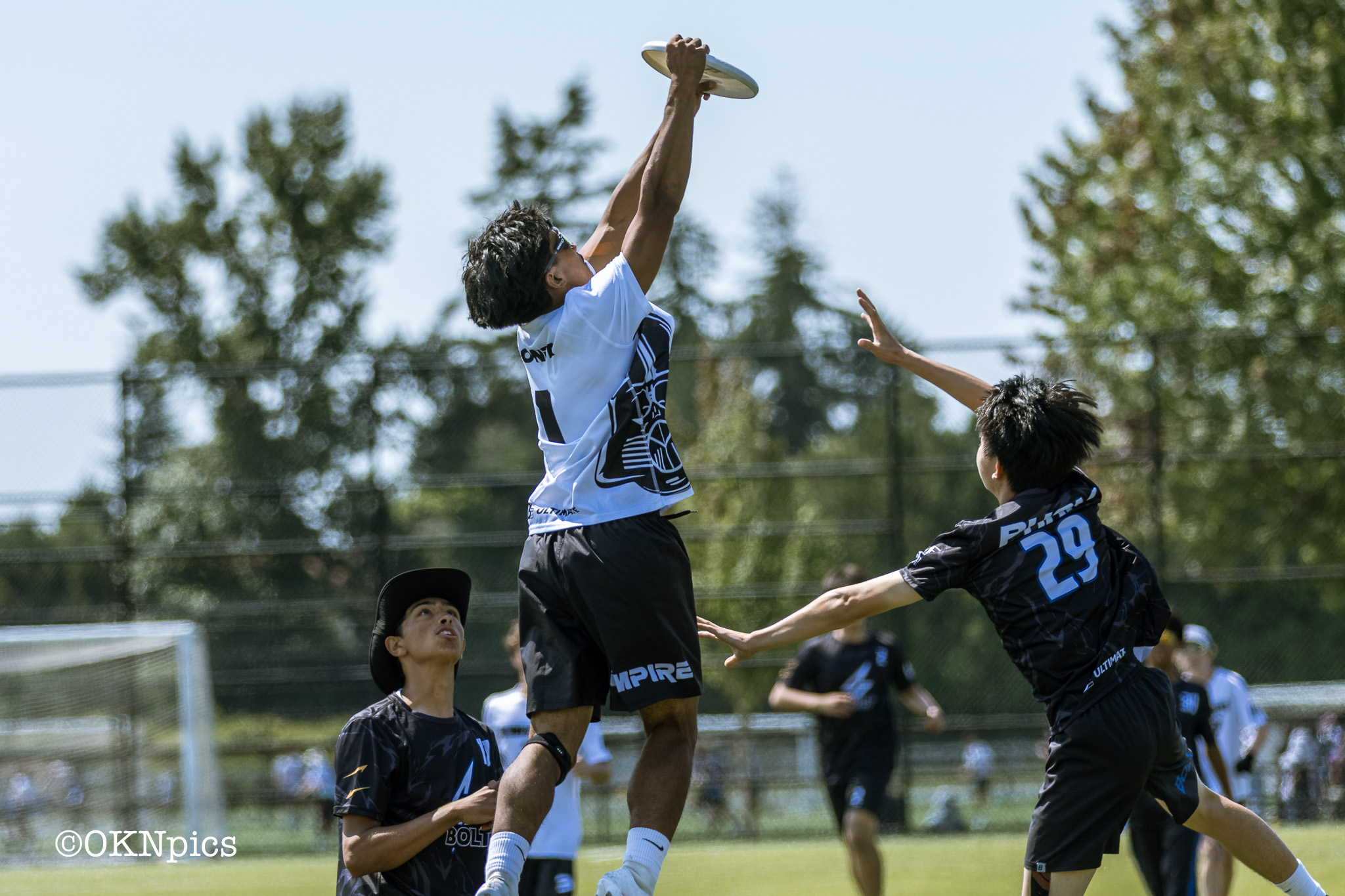 Empire player making a high catch in traffic