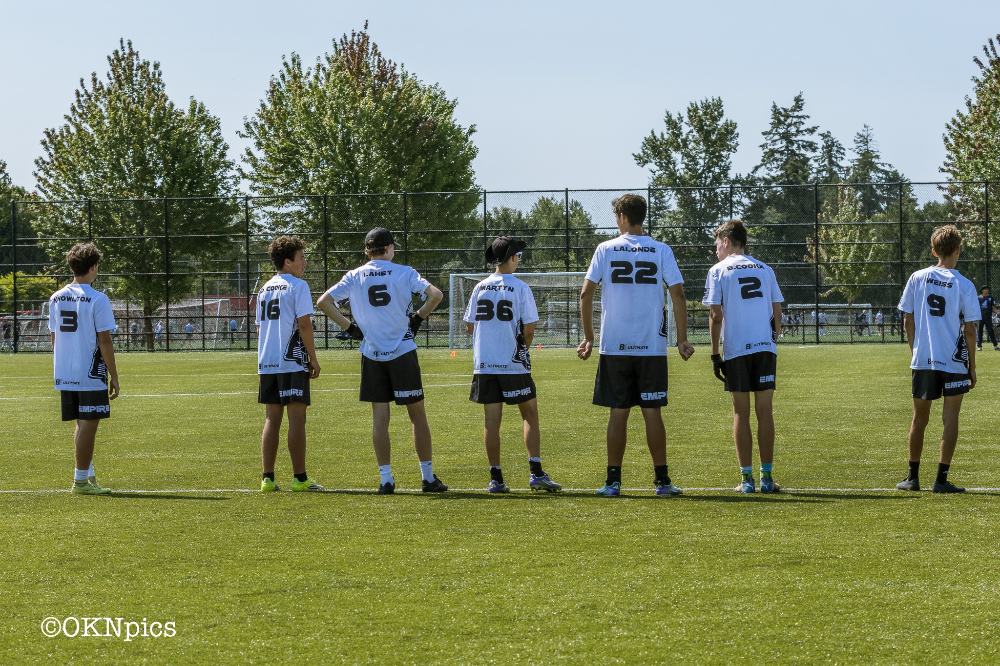 Seven Empire Ultimate players lined up together on the field